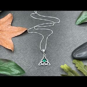 One inch Celtic Trinity Knot necklace in sterling silver with emerald